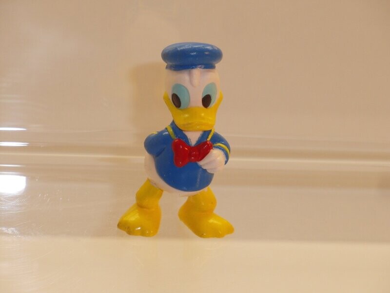 Disney Donald Duck: Panini: Donald mit Hand an der Fliege Disney Donald Duck: Panini: Donald mit Hand an der Fliege