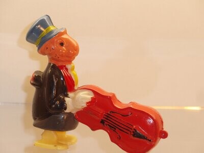 Disney's Pinocchio: Marx 60er/70er Jahre:  Jiminey Grille mit Cello als Rampenläufer-Figur