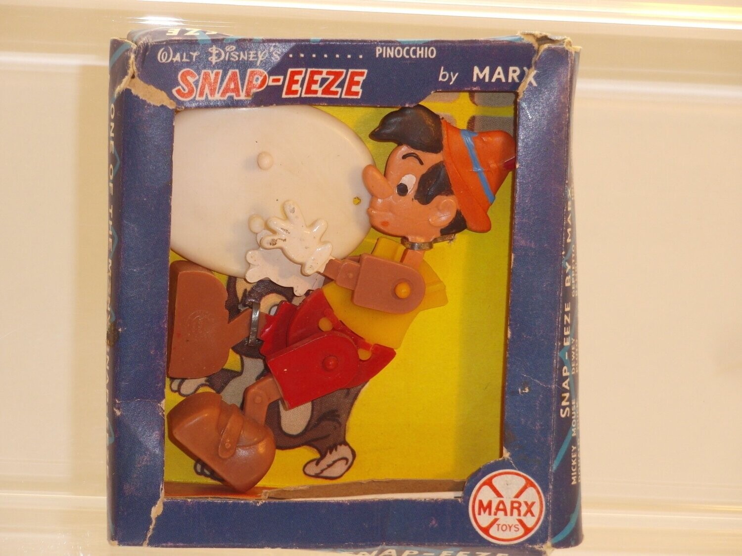 Disney's Pinocchio: Marx 60er/70er Jahre: SNAP-EEZE: Pinocchio als bewegliche Flachfigur auf Standsockel in Verpackung