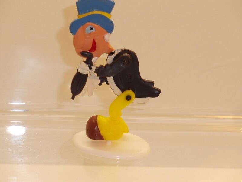Disney's Pinocchio: Marx 60er/70er Jahre: SNAP-EEZE: Jiminey Grille  als bewegliche Flachfigur auf Standsockel