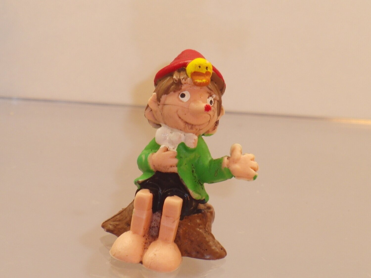 Pinocchio: Heimo 70er Jahre: Pinocchio sitzend