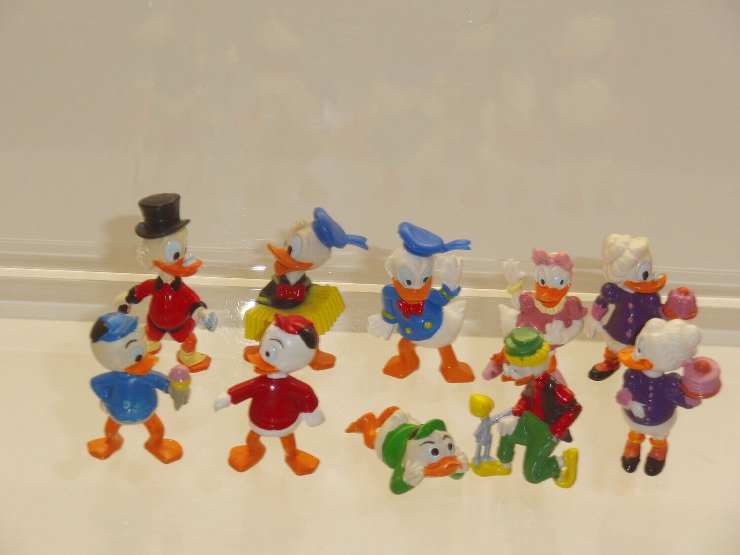 Ferrero Ü-Ei: 1987: Donald's flotte Familie: kompletter Satz mit  10 Figuren (ohne Körbchen) ohne BPZ (beide Oma Duck Figuren)