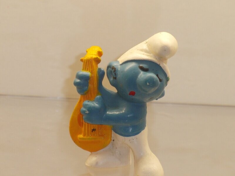 Gitarrenschlumpf 2.0013 (Gitarre gelb-ocker) Gitarrenschlumpf 2.0013 (Gitarre gelb-ocker)