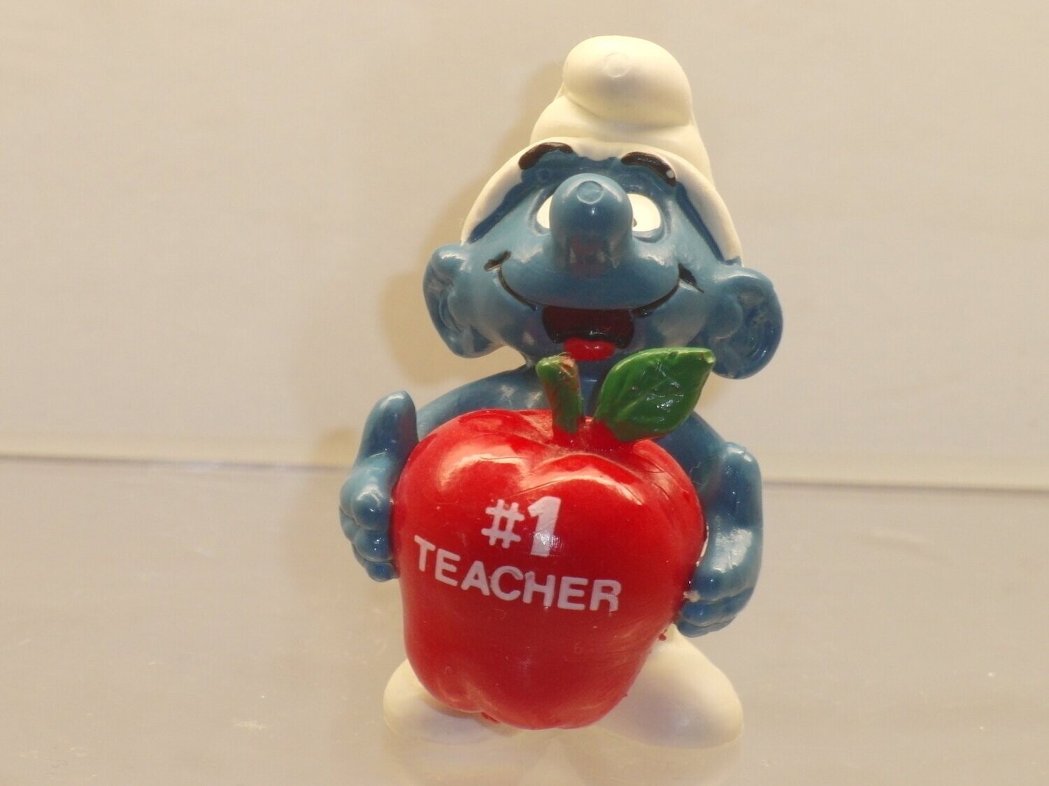 Werbeschlumpf  1# Teacher Schlumpf mit rotem Apfel