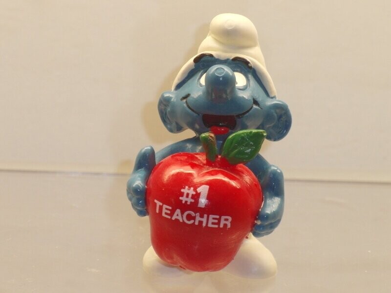 Werbeschlumpf 1# Teacher Schlumpf mit rotem Apfel Werbeschlumpf 1# Teacher Schlumpf mit rotem Apfel