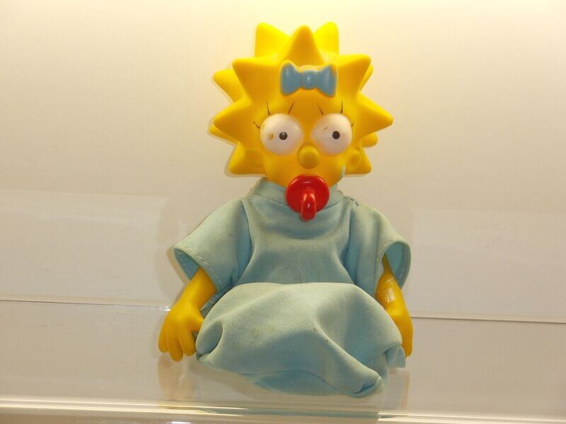 The Simpsons: 90er Jahre: Maggie Puppe (Kunststoff/Stoff) The Simpsons: 90er Jahre: Maggie Puppe (Kunststoff/Stoff)