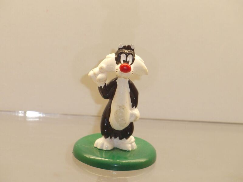 Bugs Bunny & Co.: 90er Jahre: Sylvester auf grünem Sockel Bugs Bunny & Co.: 90er Jahre: Sylvester auf grünem Sockel