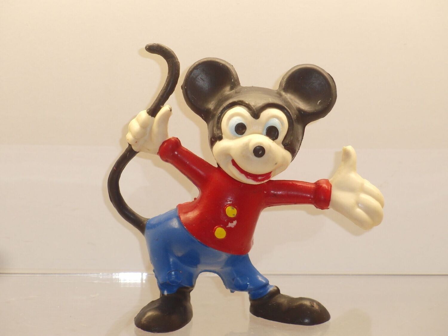 Disney: Micky Maus: Heimo 60er Jahre: Magnum Figur:Micky Hand am Schwanz