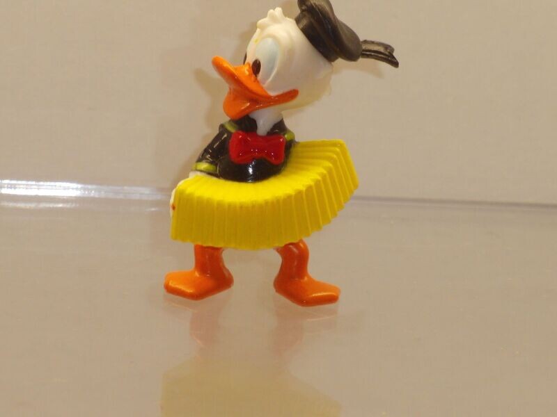 Donald's flotte Familie 1987: Donald mit Akkordeon (Mütze schwarz) Donald's flotte Familie 1987: Donald mit Akkordeon (Mütze schwarz)