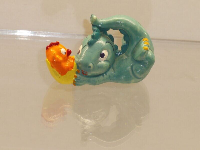 Die Drolly Dinos 1993: Trampelino, Küken orange Die Drolly Dinos 1993: Trampelino, Küken orange