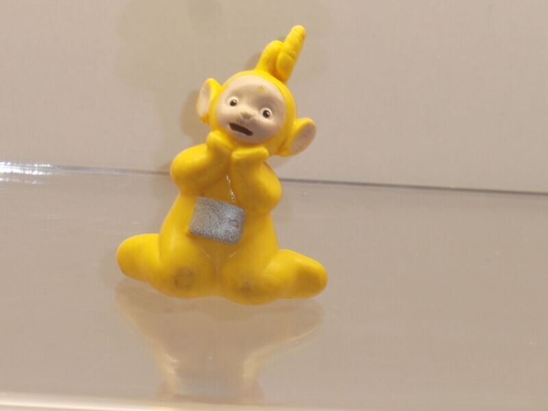 Bully/Bullyland 90er Jahre: Teletubbies: Lala sitzend Bully/Bullyland 90er Jahre: Teletubbies: Lala sitzend