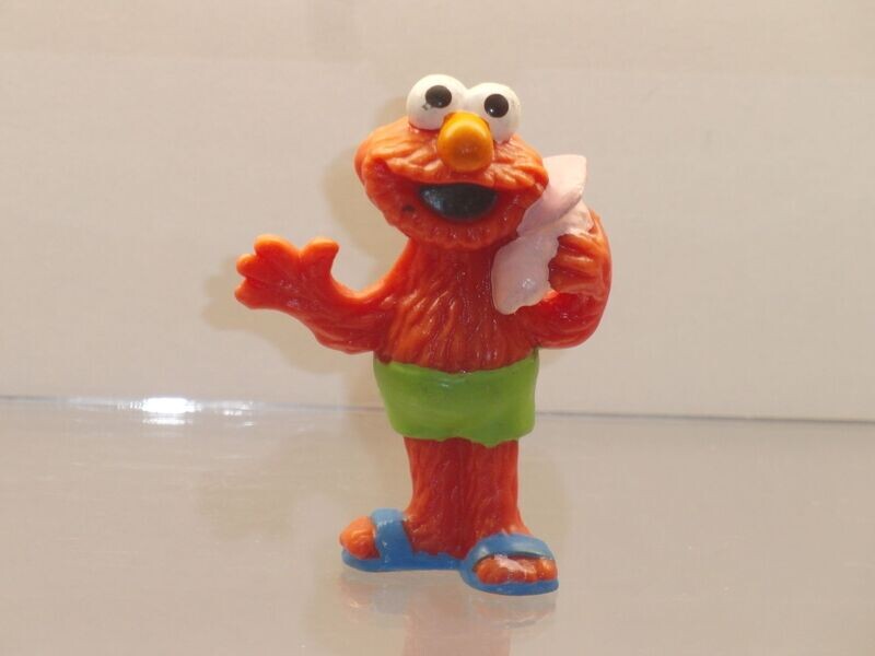Sesamstraße: Applause: Elmo mit Muschel (Beschädigung auf Unterseite) Sesamstraße: Applause: Elmo mit Muschel (Beschädigung auf Unterseite)