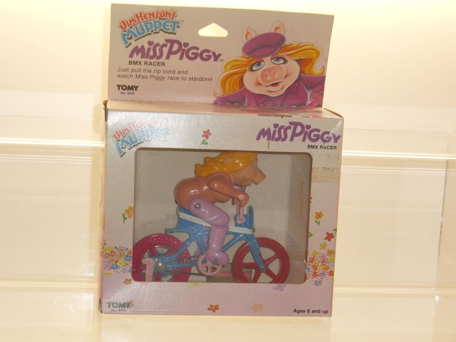 Muppet Show: Tomy 1983: Miss Piggy BMX Racer in Verpackung