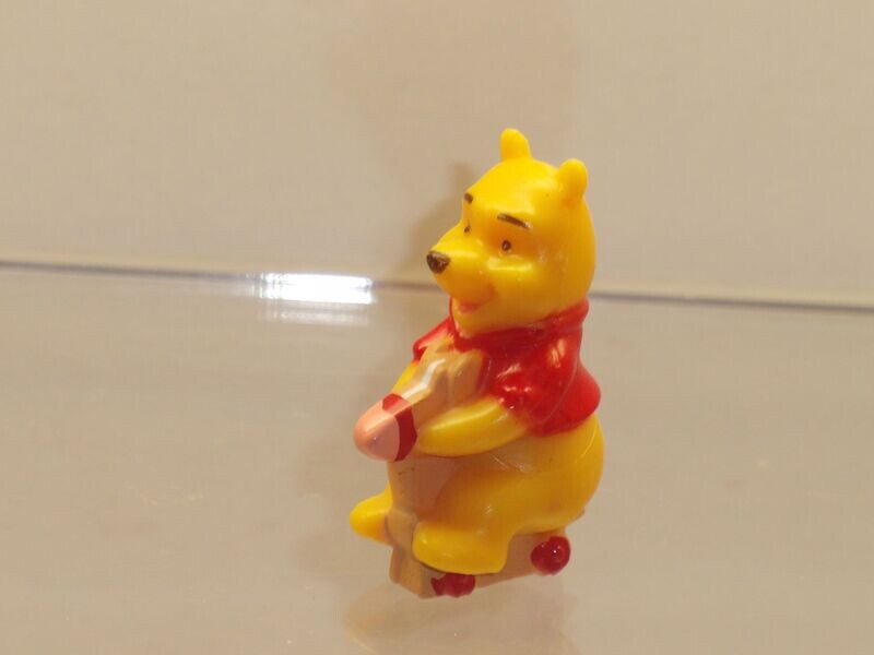 Disney's Winnie Puuh: Mini-Figur: Winnie Puuh auf Holzpferd Disney's Winnie Puuh: Mini-Figur: Winnie Puuh auf Holzpferd