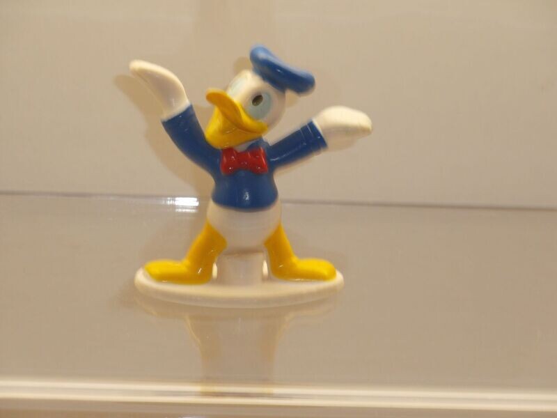 Disney Donald Duck: Nestle: 90er Jahre: Donald, beide Hände gehoben Disney Donald Duck: Nestle: 90er Jahre: Donald, beide Hände gehoben