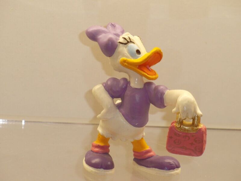 Disney Daisy Duck: Bully/Bullyland: Daisy mit Tasche (Schleife lila) Disney Daisy Duck: Bully/Bullyland: Daisy mit Tasche (Schleife lila)