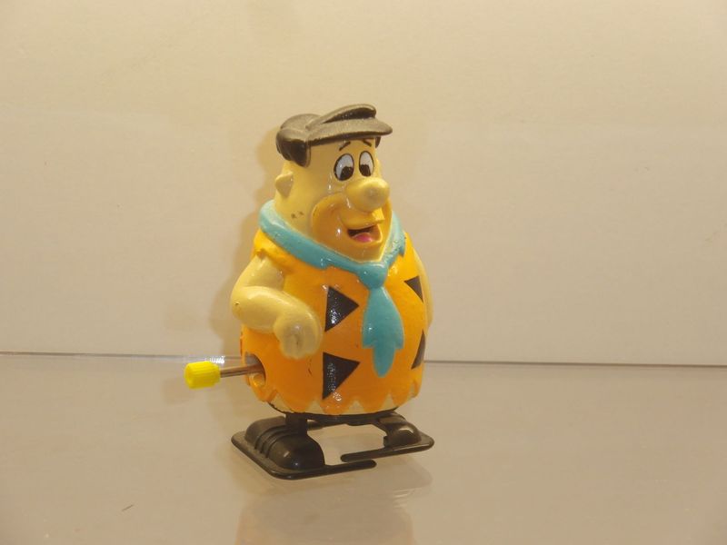 Familie Feuerstein: 90er Jahre: Fred Feuerstein als Aufzieh-Figur Familie Feuerstein: 90er Jahre: Fred Feuerstein als Aufzieh-Figur