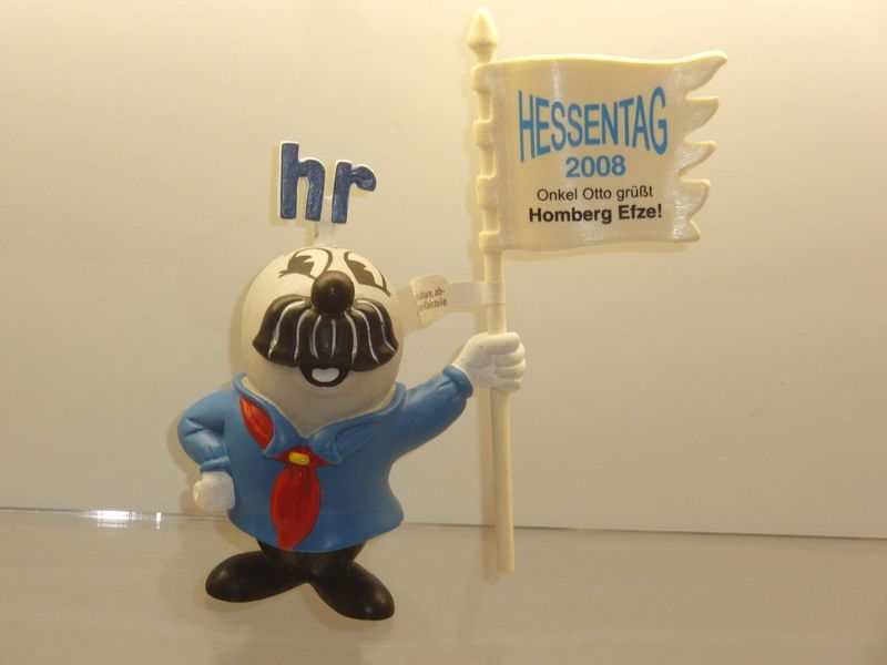 Werbefiguren: HR-Fernsehen: Onkel Otto: Schleich 2000er Jahre: Onkel Otto mit Werbefahne Hessentag 2008 Homberg Efze