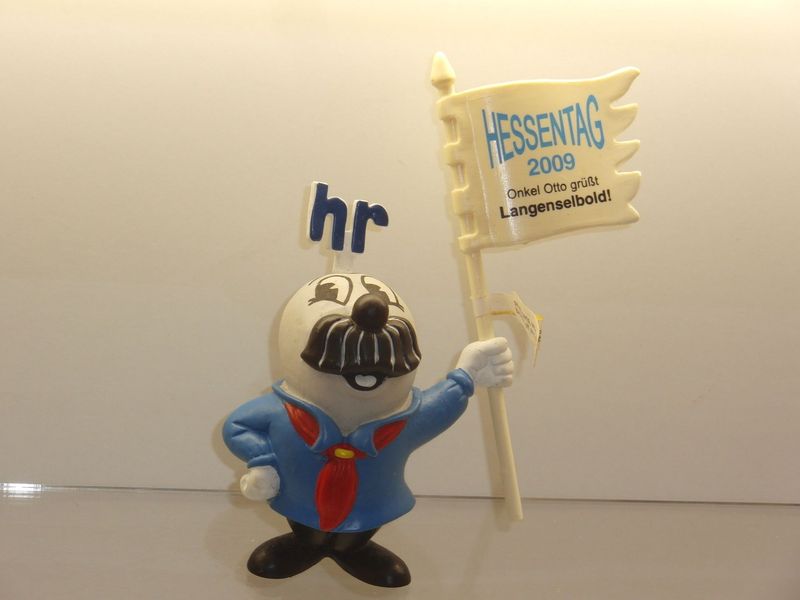 Werbefiguren: HR-Fernsehen: Onkel Otto: Schleich 2000er Jahre: Onkel Otto mit Werbefahne Hessentag 2009 Langenselbold