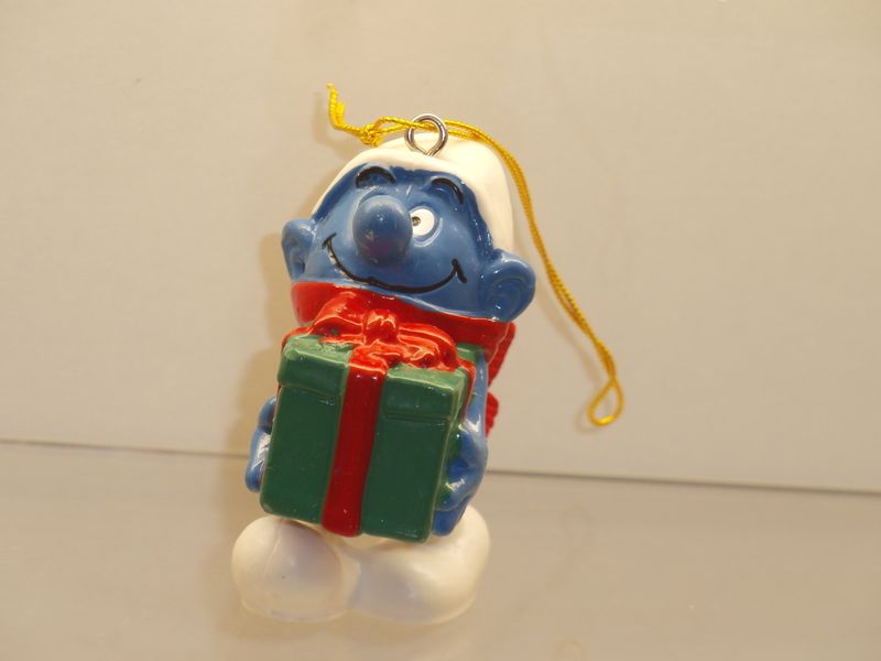 Schlumpf mit Weihnachtspaket 5.1902 (CE-Zeichen) Schlumpf mit Weihnachtspaket 5.1902 (CE-Zeichen)