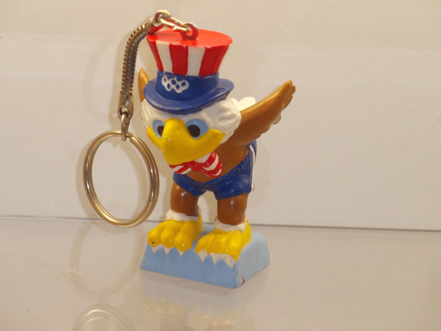 Werbefiguren: Olympische Spiele Los Angeles 1984: Maskottchen Sam als Schwimmer (Schlüsselanhänger)