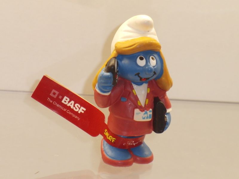 Werbeschlumpf BASF Hexalotte Managerin Schlumpfine mit Banderole Werbeschlumpf BASF Hexalotte Managerin Schlumpfine mit Banderole