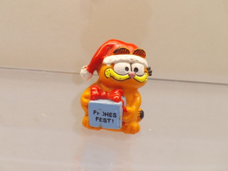 Garfield: Bully: Garfield Mini als Weihnachtsmann (Aufdruck frohes Fest) Garfield: Bully: Garfield Mini als Weihnachtsmann (Aufdruck frohes Fest)