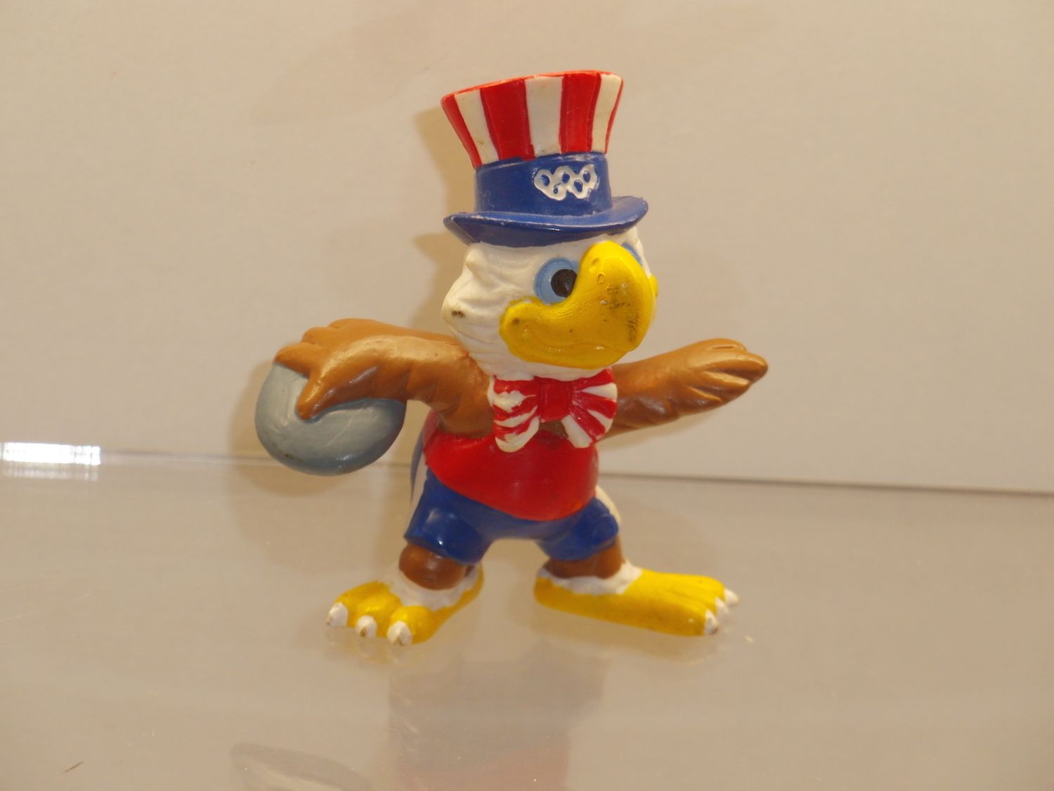Werbefiguren: Olympische Spiele Los Angeles 1984: Maskottchen Sam als Diskuswerfer Werbefiguren: Olympische Spiele Los Angeles 1984: Maskottchen Sam als Diskuswerfer