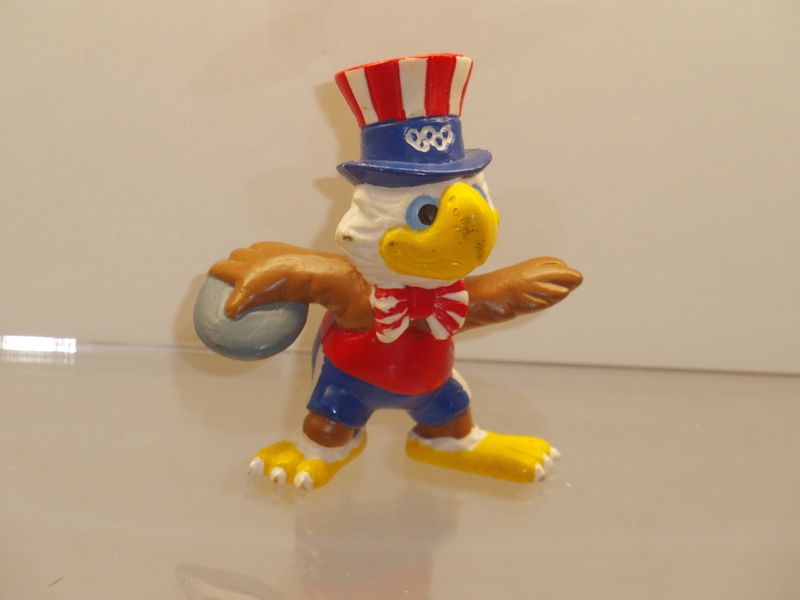 Werbefiguren: Olympische Spiele Los Angeles 1984: Maskottchen Sam als Diskuswerfer Werbefiguren: Olympische Spiele Los Angeles 1984: Maskottchen Sam als Diskuswerfer