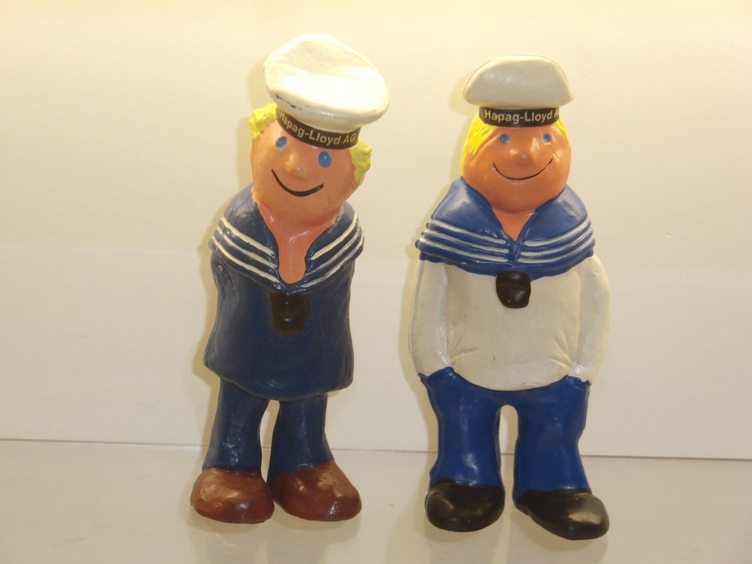 Werbefiguren: Hapag-Lloyd AG: 2 verschiedene Matrosen je ca. 13cm Werbefiguren: Hapag-Lloyd AG: 2 verschiedene Matrosen je ca. 13cm