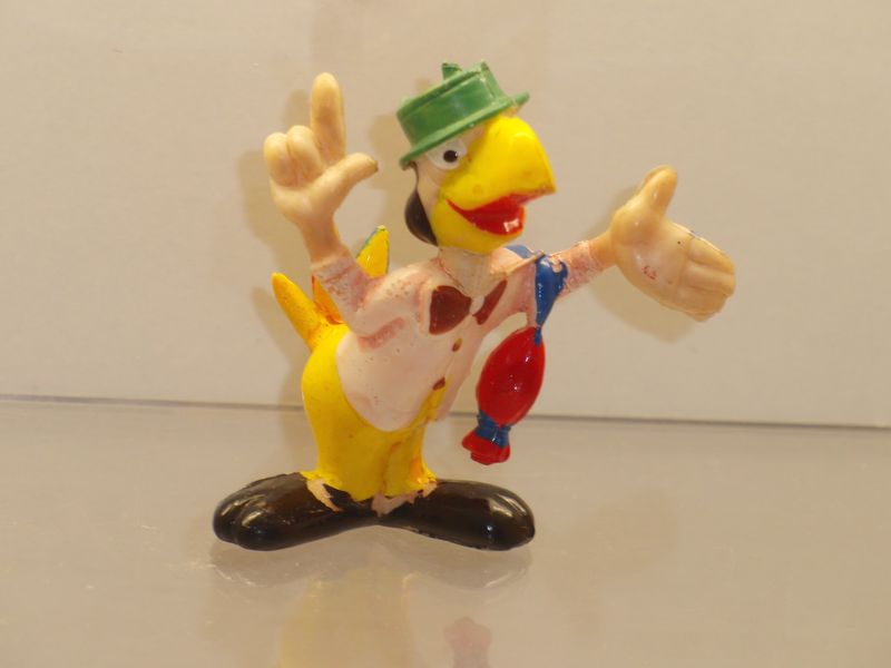 Disney's Drei Caballeros: Heimo 60er Jahre: Joe Carioca (Jacke rosa, Hose gelb) Disney's Drei Caballeros: Heimo 60er Jahre: Joe Carioca (Jacke rosa, Hose gelb)