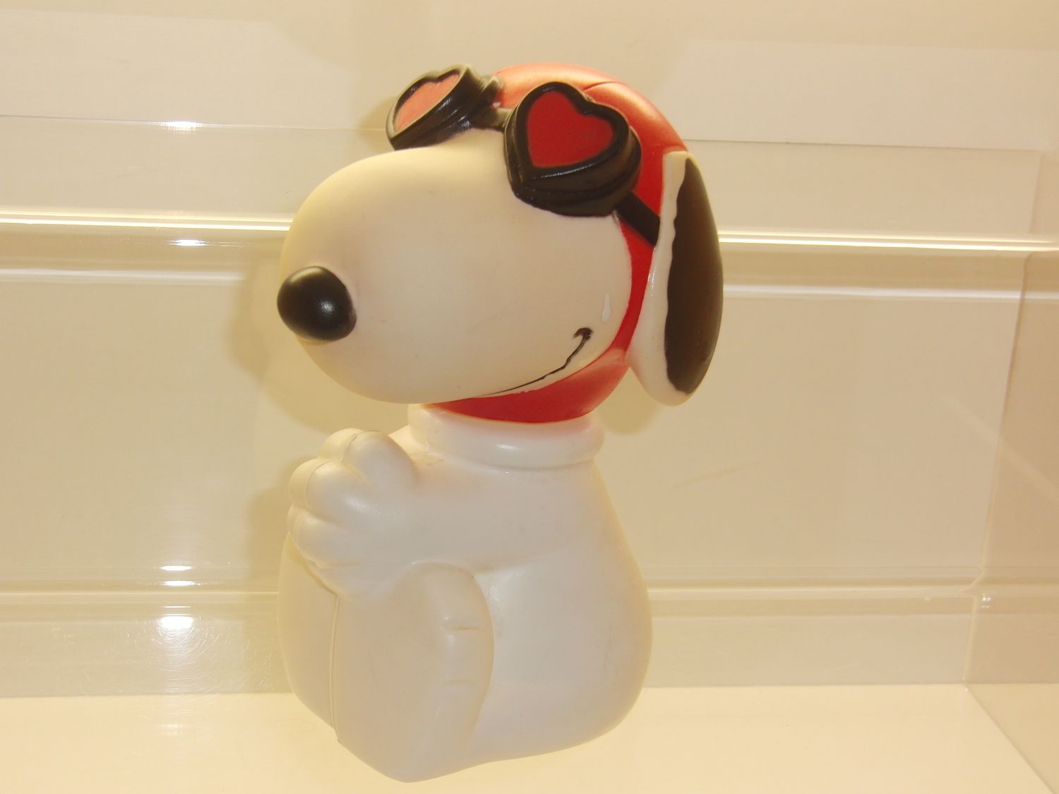 Snoopy/Peanuts: Snoopy als Pilot (Badeschaumflasche) aus den 80er Jahren, ca. 17cm Snoopy/Peanuts: Snoopy als Pilot (Badeschaumflasche) aus den 80er Jahren, ca. 17cm