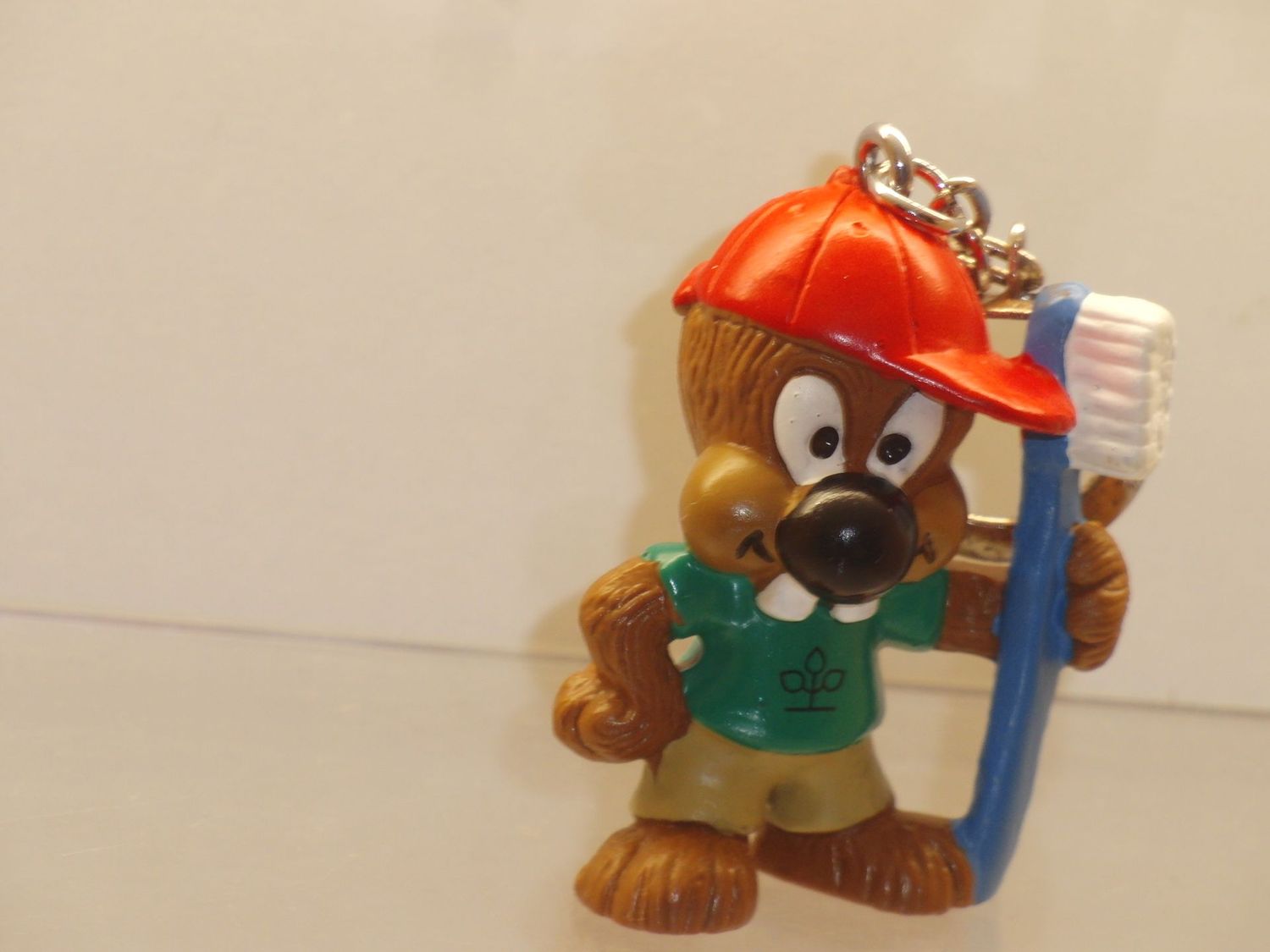 Werbefiguren: AOK: Bullyland ca. 90er Jahre, Putzi als Schlüsselanhänger (neue Form)