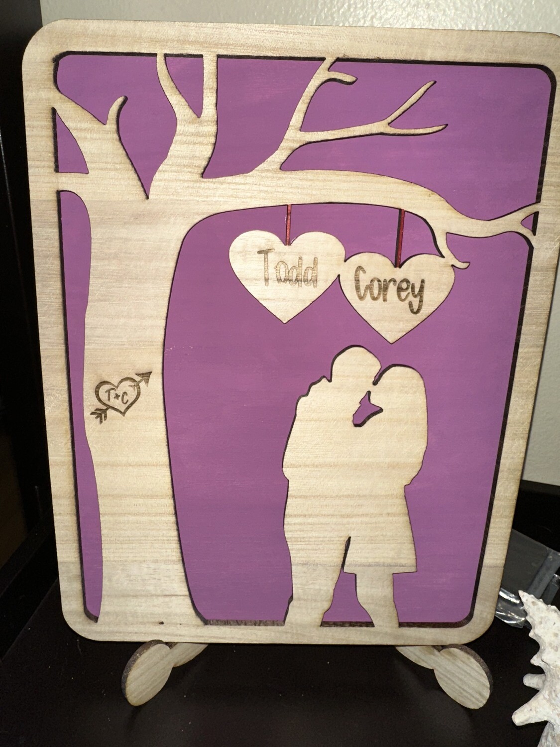 Couple with Tree Sign