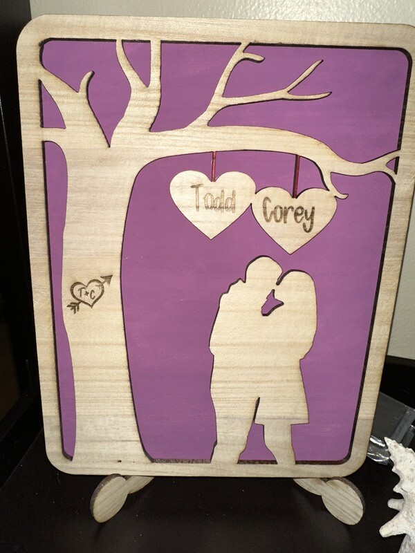 Couple with Tree Sign