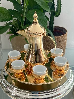 Coffee cups set with coffee pot