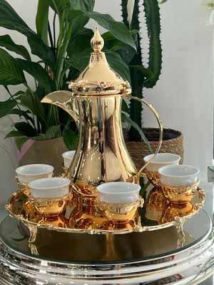 Coffee cups set with coffee pot