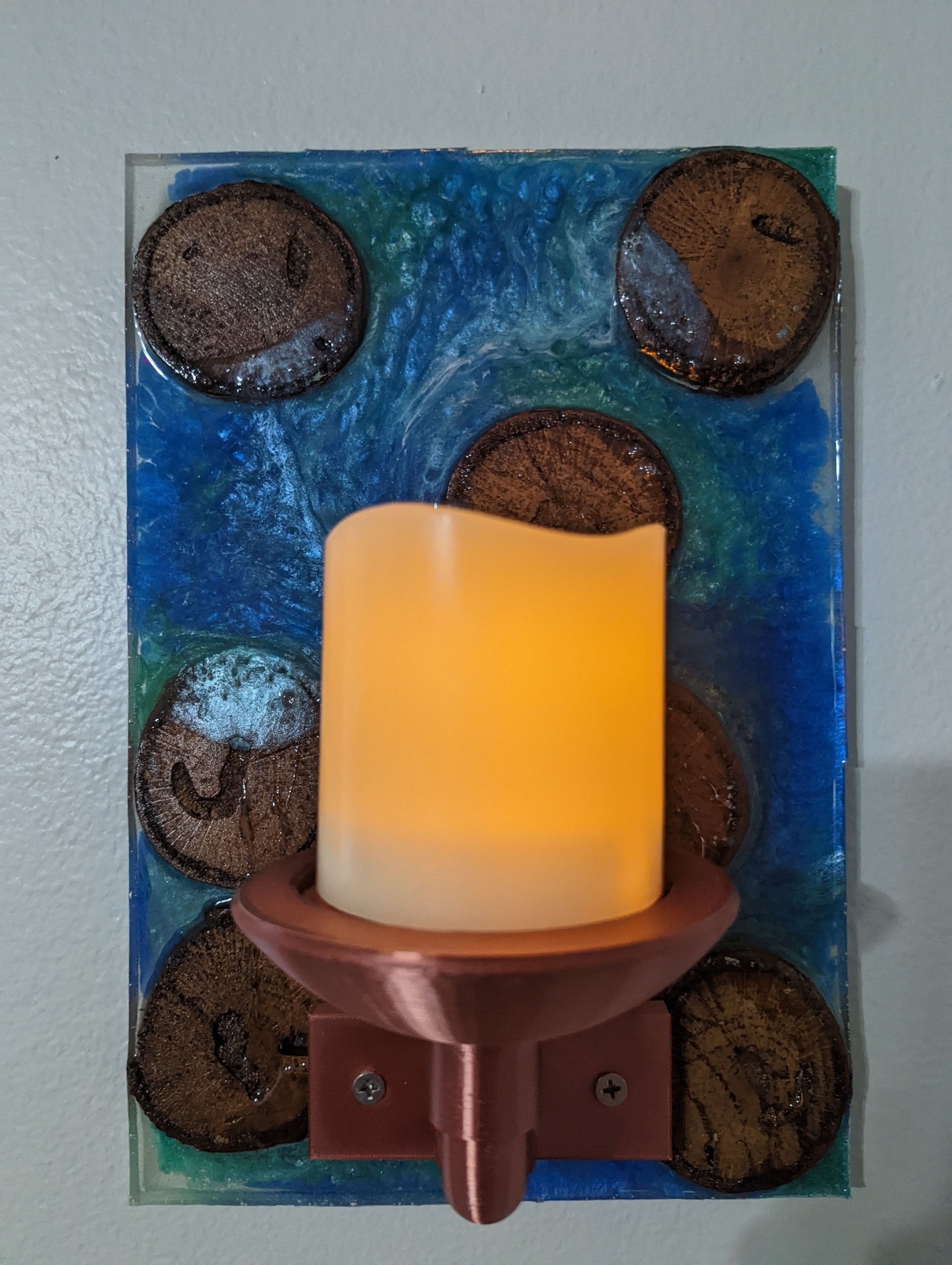 Floating logs in the river wall sconce