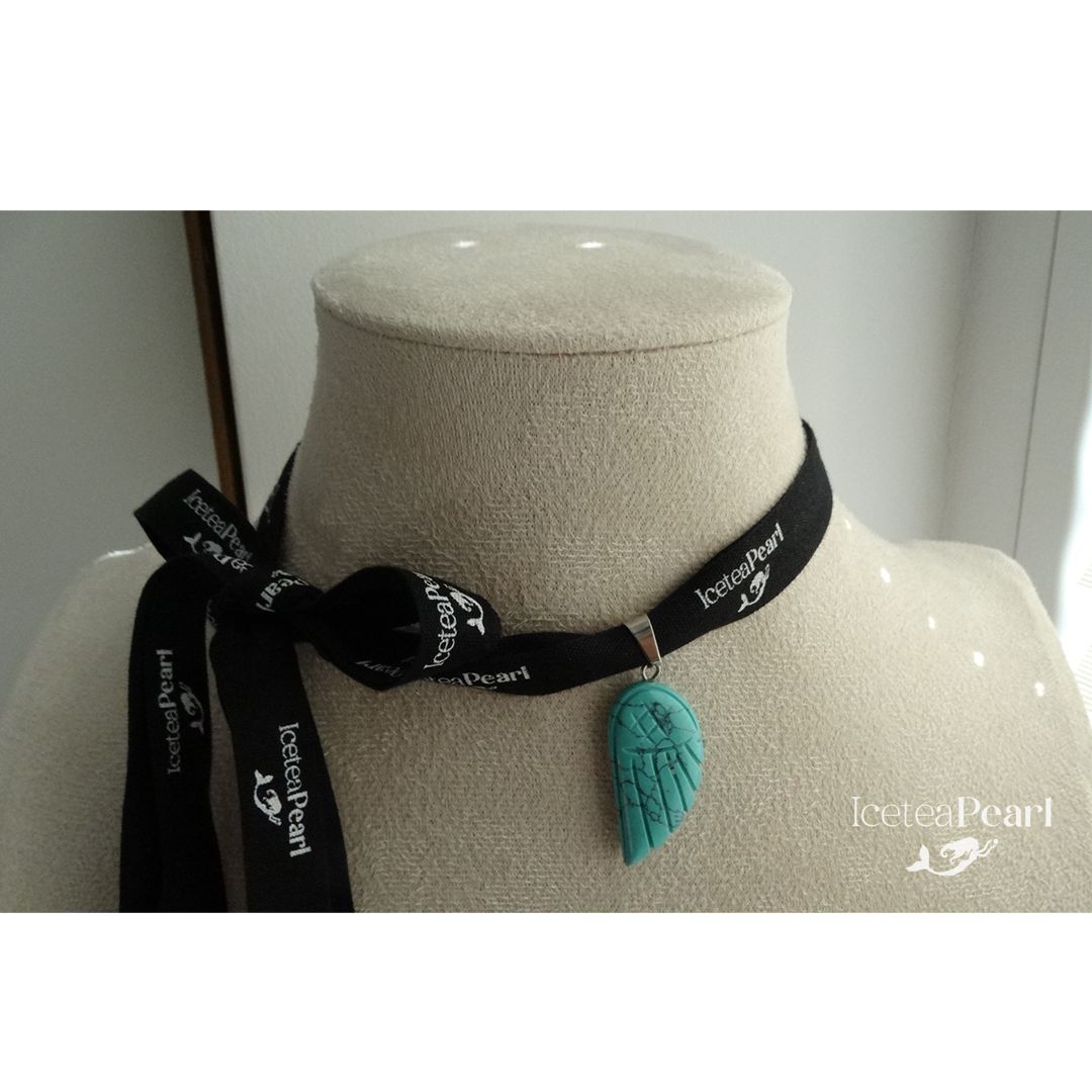 Random &quot;Wings&quot; Black ribbon