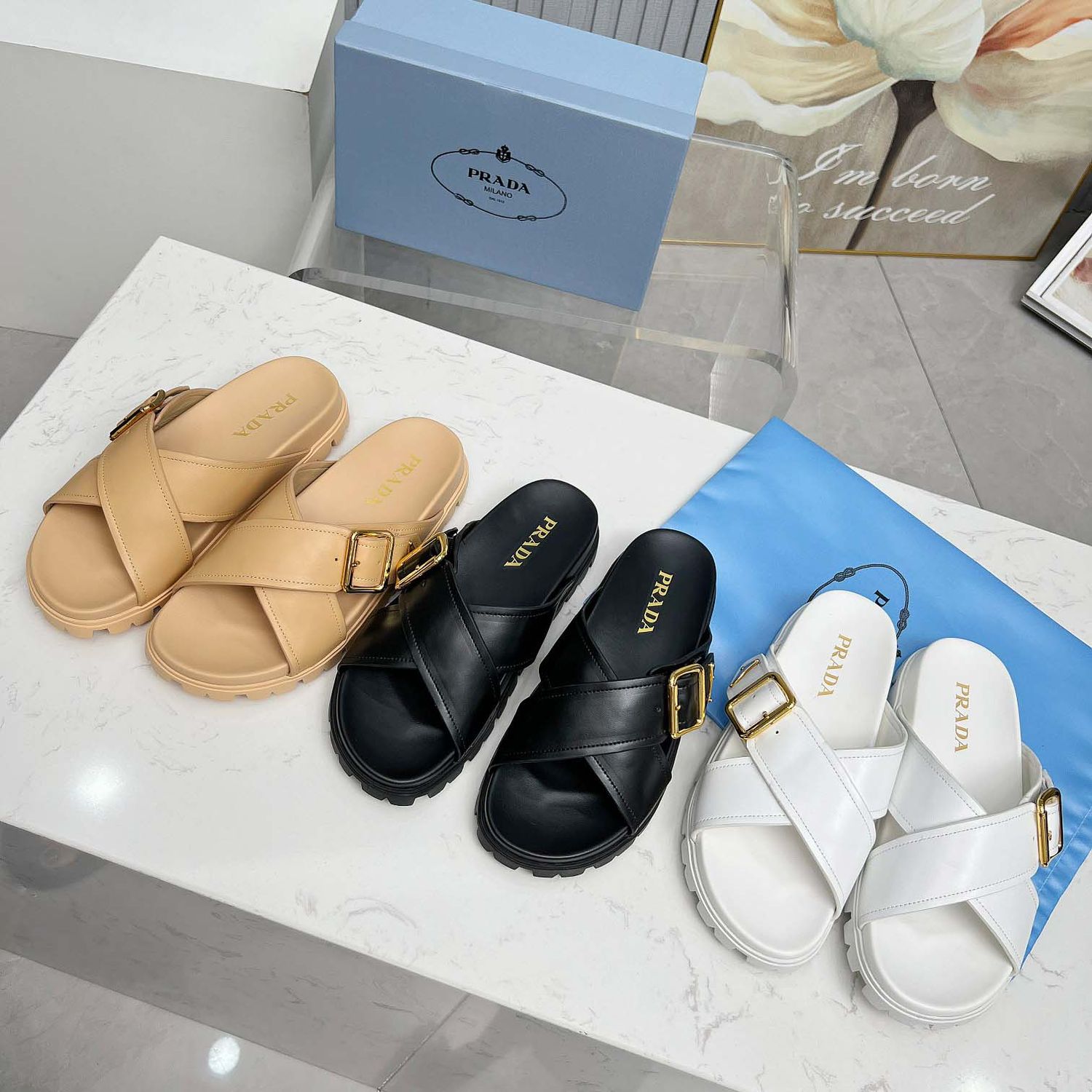PRADA leather strap slide