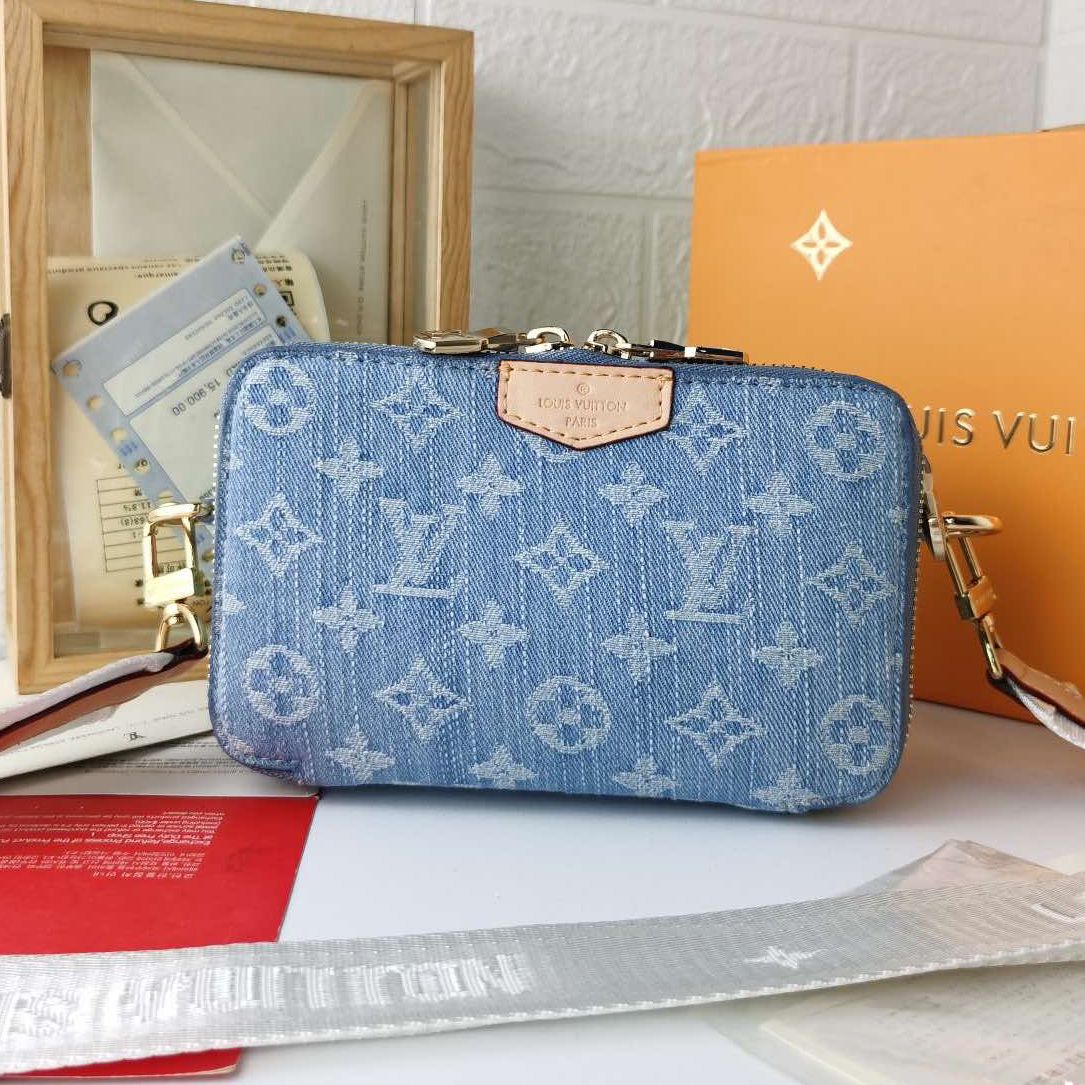 LV denim clutch