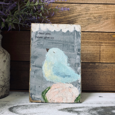 hand painted blue bird with pink flower