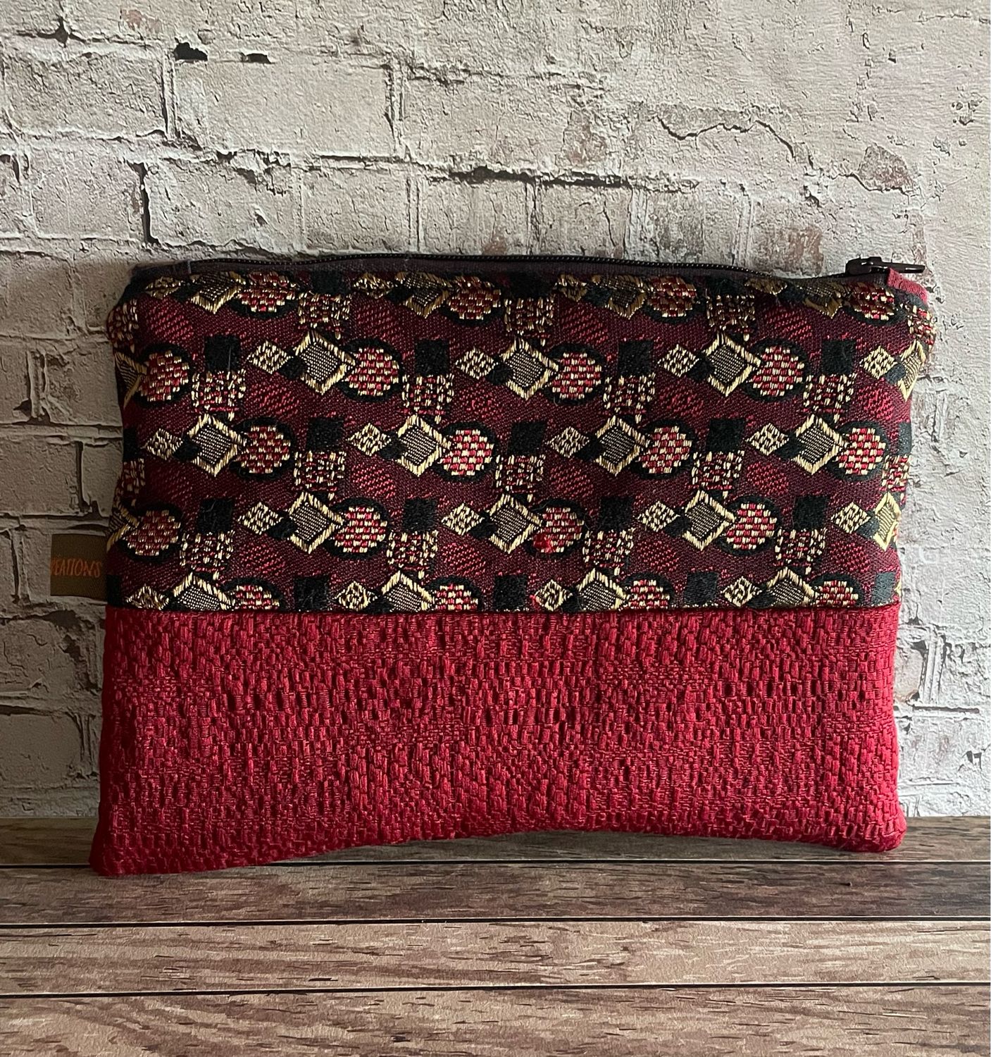 Trousse précieuse bordeaux rouge