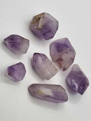 Amethyst in Quartz Point With Inclusions