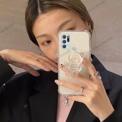 Cover con pop socket de osito transparente