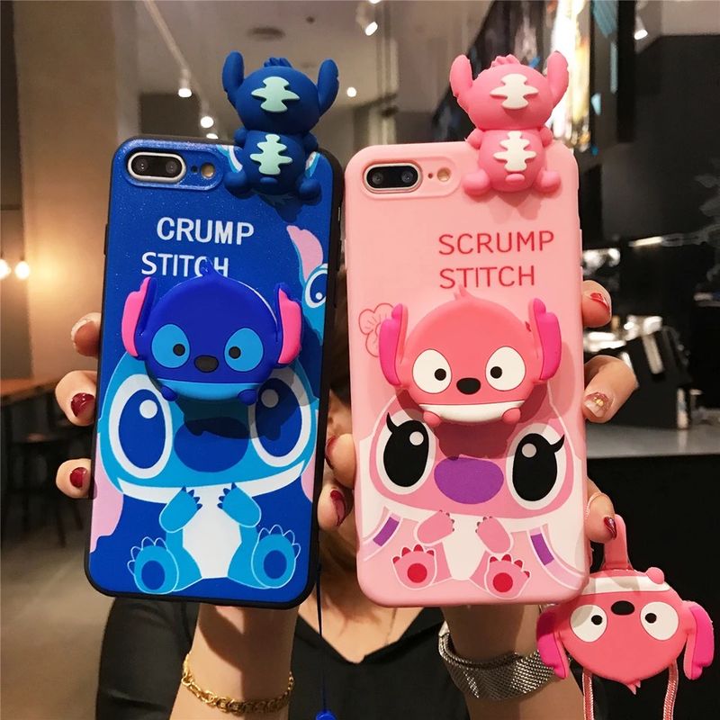 Cover Stitch y Angel con popsocket y landyard