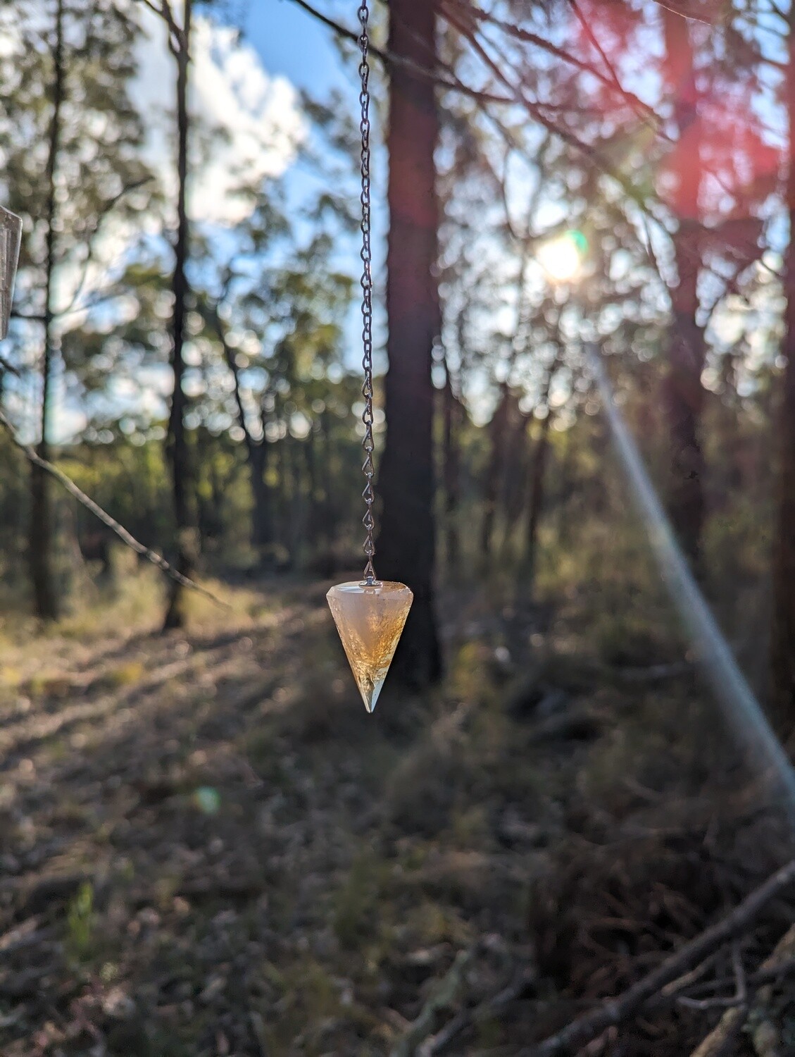 Citrine crystal pendulum for dowsing and divination