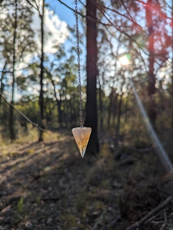 Citrine crystal pendulum for dowsing and divination