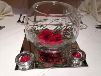 Gerbera Fishbowl vases to hire with mirror plates and tealights for weddings and events