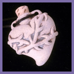 Hand Carved double sided Clay Necklaces